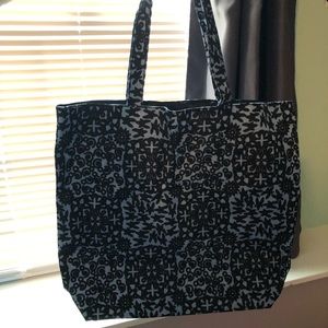 Medium sized navy and light blue hand bag